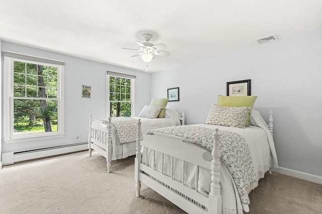 80 Christian Way, North Andover, MA 01845 - carpeted bedroom featuring a baseboard heating unit and a ceiling fan