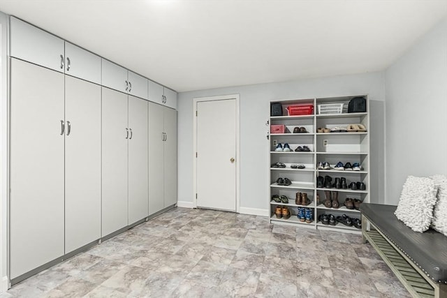 80 Christian Way, North Andover, MA 01845 - mudroom featuring stone finish floors and baseboards
