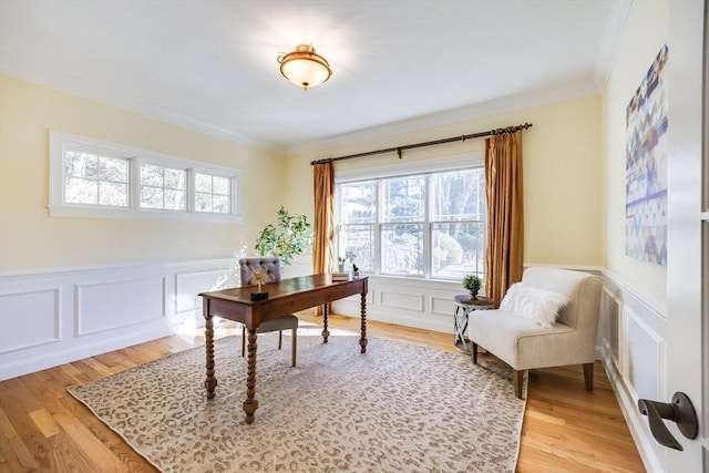 office with crown molding and light wood-type flooring