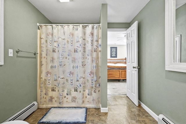 13 Hoyt Ave, Amesbury, MA 01913 - ensuite bathroom featuring a baseboard heating unit and a shower with curtain