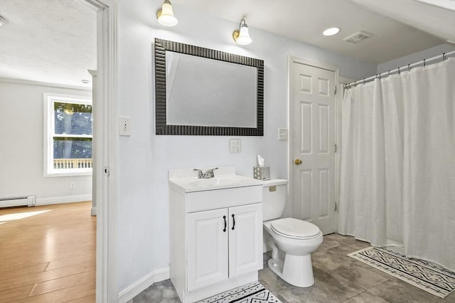 13 Hoyt Ave, Amesbury, MA 01913 - full bath with vanity, baseboard heating, and a shower with shower curtain