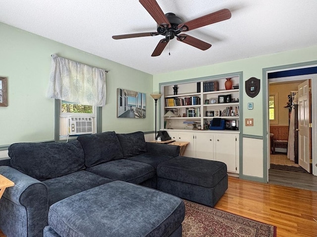 233 Old Wendell Rd, Northfield, MA 01360 - living area with light wood-style floors, cooling unit, a ceiling fan, and a textured ceiling