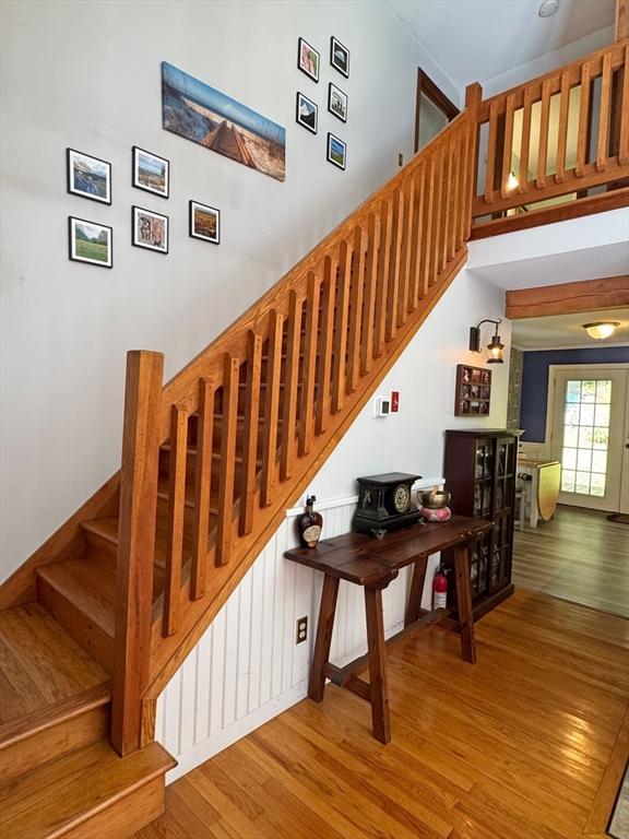 233 Old Wendell Rd, Northfield, MA 01360 - stairway featuring wood finished floors and a towering ceiling