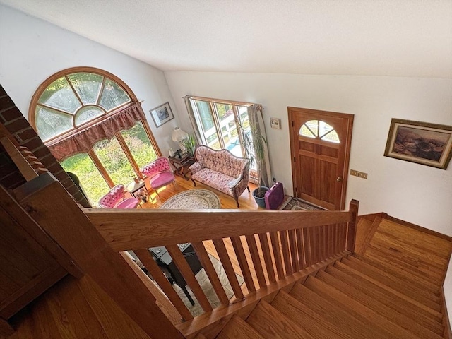 233 Old Wendell Rd, Northfield, MA 01360 - entrance foyer with lofted ceiling, healthy amount of natural light, stairway, and wood finished floors