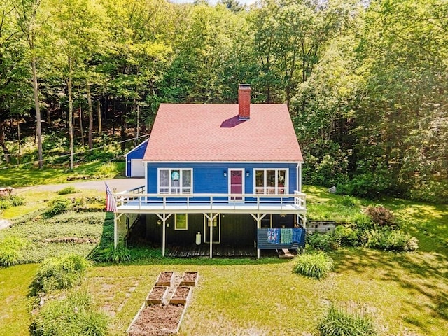 233 Old Wendell Rd, Northfield, MA 01360 - rear view of house with a wooden deck, a chimney, a yard, and a wooded view