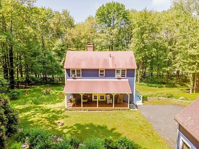 233 Old Wendell Rd, Northfield, MA 01360 - view of front of house with a porch, a chimney, a front yard, and a forest view