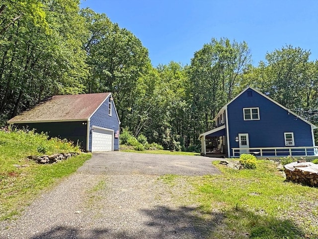 233 Old Wendell Rd, Northfield, MA 01360 - view of property exterior with an outdoor structure and a detached garage