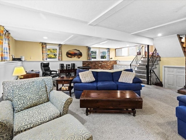 carpeted living room featuring stairway and recessed lighting