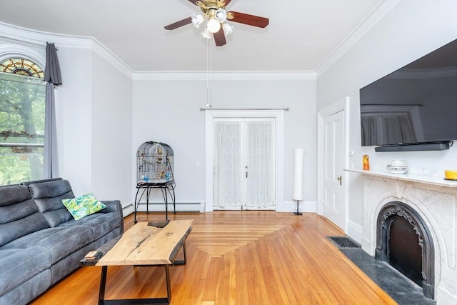 4 Mount Vernon Unit 1, Haverhill, MA 01830 - living area with a baseboard radiator, ceiling fan, ornamental molding, a fireplace, and baseboards