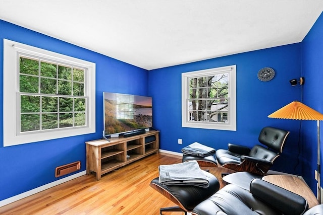 42 Howe St, Ipswich, MA 01938 - living area with wood finished floors and baseboards
