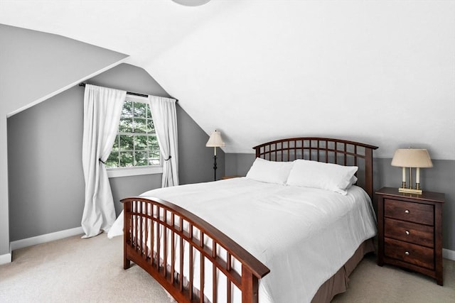 42 Howe St, Ipswich, MA 01938 - bedroom with light carpet, lofted ceiling, and baseboards