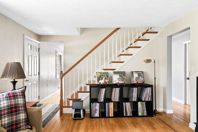 42 Howe St, Ipswich, MA 01938 - staircase with wood finished floors and baseboards
