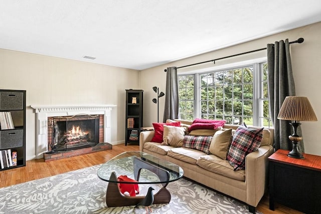42 Howe St, Ipswich, MA 01938 - living area with wood finished floors and a fireplace