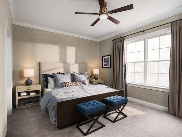 bedroom featuring crown molding, light carpet, and ceiling fan