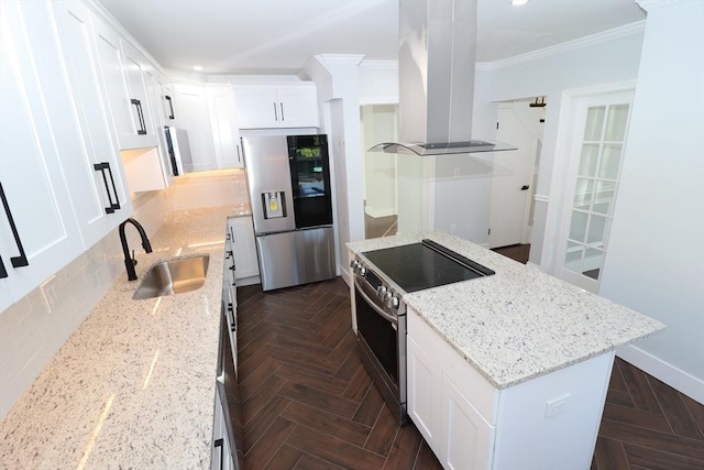 kitchen featuring light stone countertops, sink, stainless steel appliances, island range hood, and white cabinets