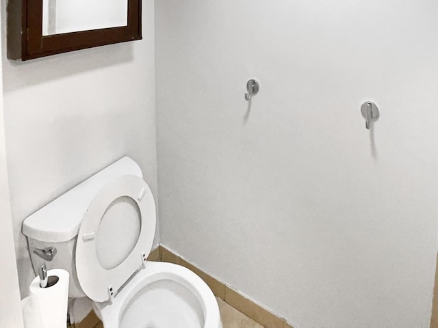 444 Lowell St, Reading, MA 01867 - bathroom featuring toilet and baseboards