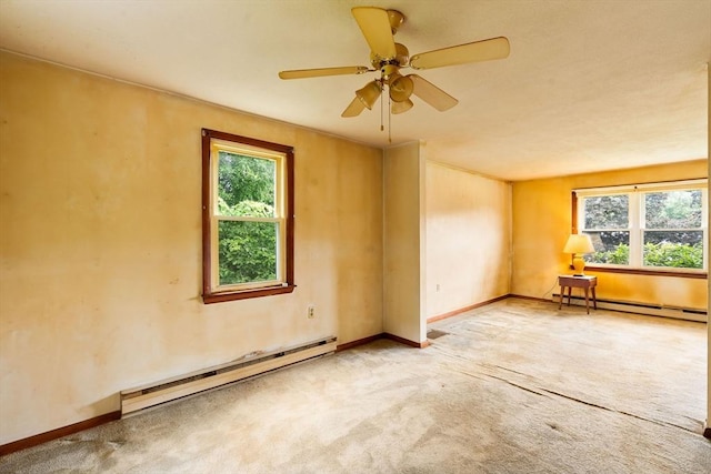 79 Chapel St, Gardner, MA 01440 - empty room featuring baseboard heating, carpet flooring, and plenty of natural light