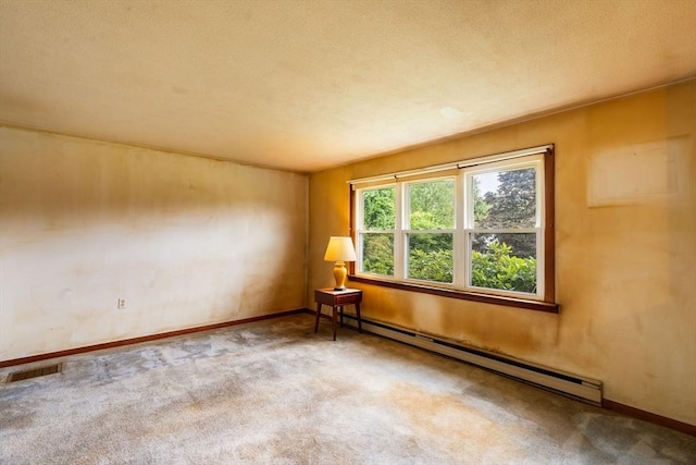 79 Chapel St, Gardner, MA 01440 - spare room featuring a baseboard radiator and carpet
