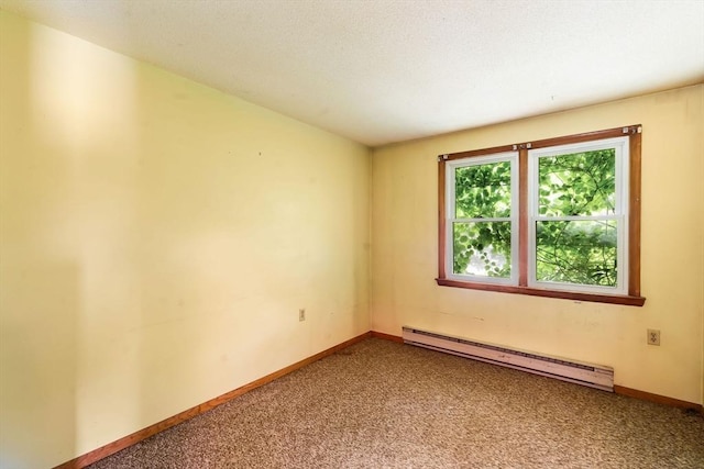79 Chapel St, Gardner, MA 01440 - empty room featuring a baseboard radiator and carpet
