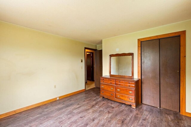 79 Chapel St, Gardner, MA 01440 - unfurnished bedroom featuring wood finished floors and a closet