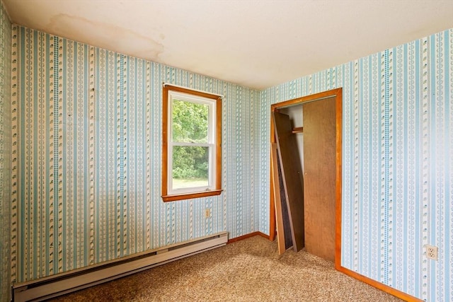79 Chapel St, Gardner, MA 01440 - unfurnished bedroom with a baseboard radiator and carpet floors