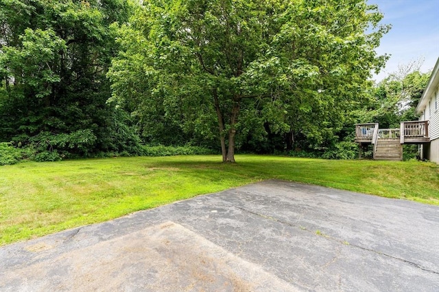 79 Chapel St, Gardner, MA 01440 - view of green lawn with a deck and stairway