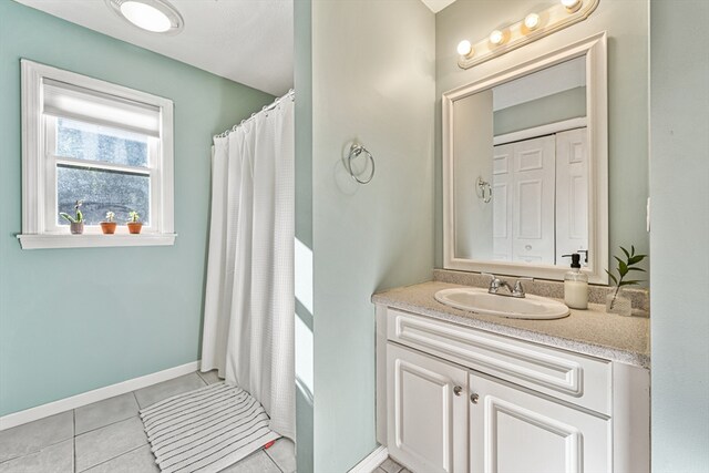 bathroom with vanity and tile patterned floors