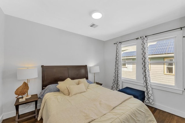 72 Rawson Rd Unit 2, Arlington, MA 02474 - bedroom featuring wood finished floors and baseboards