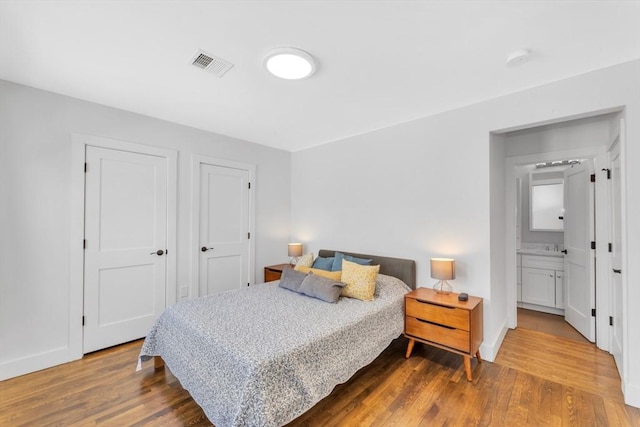 72 Rawson Rd Unit 2, Arlington, MA 02474 - bedroom featuring wood finished floors and baseboards