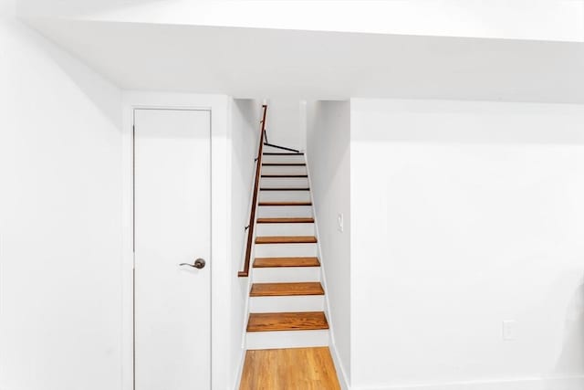 72 Rawson Rd Unit 2, Arlington, MA 02474 - stairway with wood finished floors and baseboards