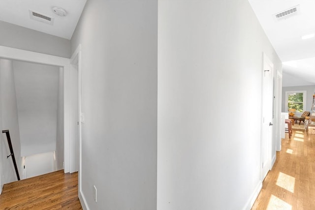 72 Rawson Rd Unit 2, Arlington, MA 02474 - corridor featuring an upstairs landing and light wood finished floors