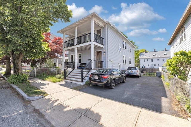 72 Rawson Rd Unit 2, Arlington, MA 02474 - townhome / multi-family property featuring a balcony