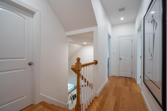 16 Border Rd, Reading, MA 01867 - corridor featuring an upstairs landing, light wood-type flooring, and recessed lighting