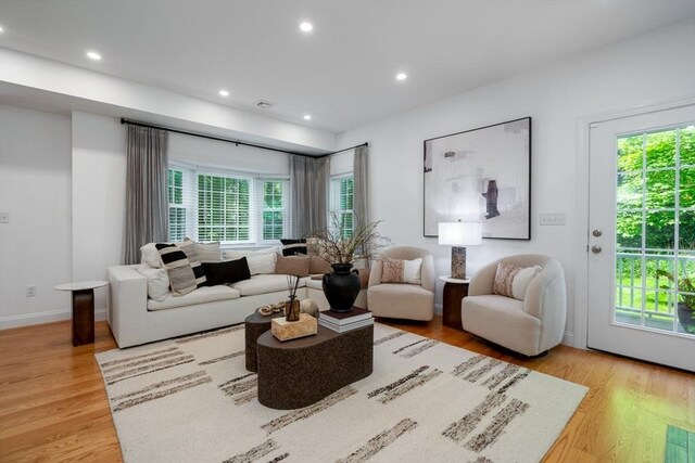 16 Border Rd, Reading, MA 01867 - living room with light wood-type flooring and recessed lighting