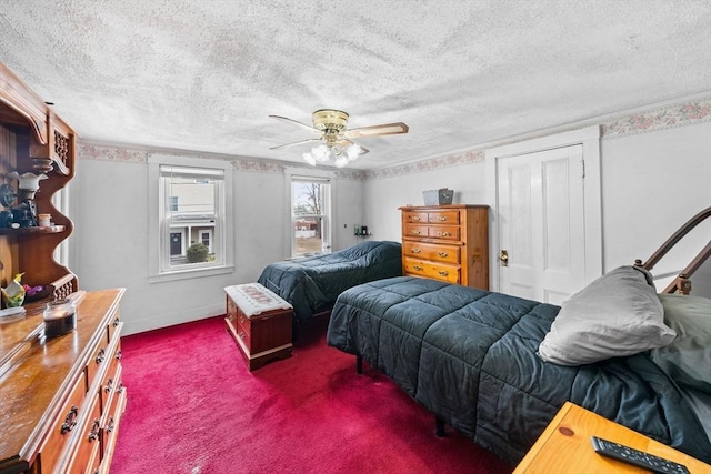 bedroom with carpet floors, ceiling fan, a textured ceiling, and baseboards