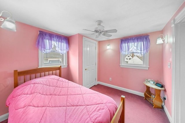 bedroom featuring carpet floors, baseboards, and a ceiling fan