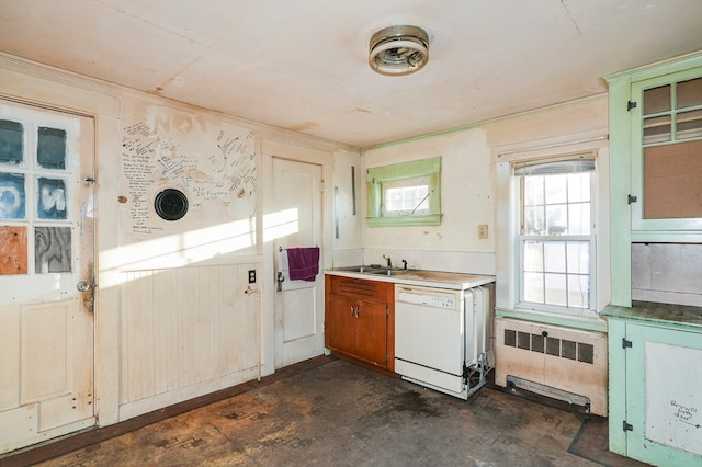 kitchen featuring radiator, dishwasher, and sink