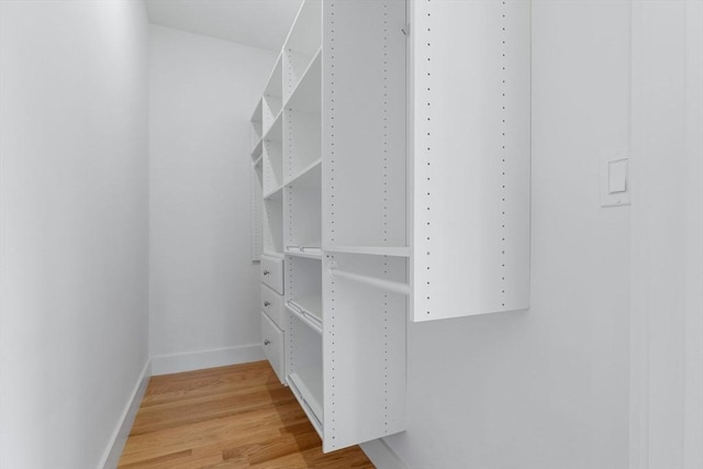 walk in closet featuring light wood-type flooring