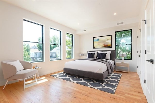 bedroom featuring light hardwood / wood-style floors