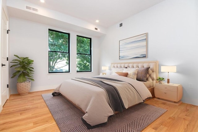 bedroom with light hardwood / wood-style floors