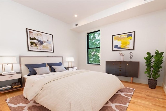 bedroom featuring light wood-type flooring