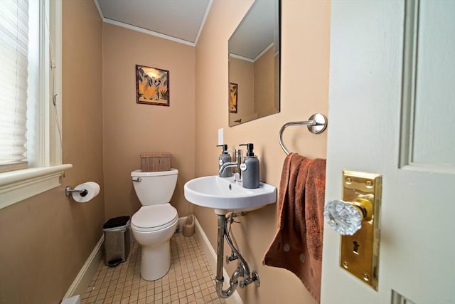 149 Milton Ave, Boston, MA 02124 - bathroom with toilet, crown molding, baseboards, and a sink