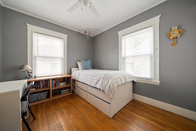 149 Milton Ave, Boston, MA 02124 - bedroom featuring crown molding, hardwood / wood-style flooring, baseboards, and ceiling fan