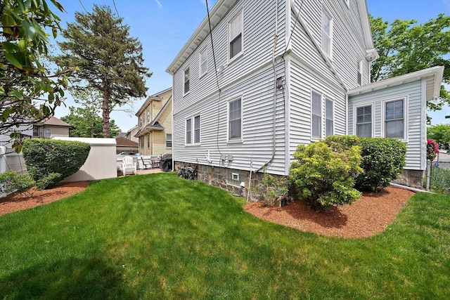149 Milton Ave, Boston, MA 02124 - view of side of property with a yard