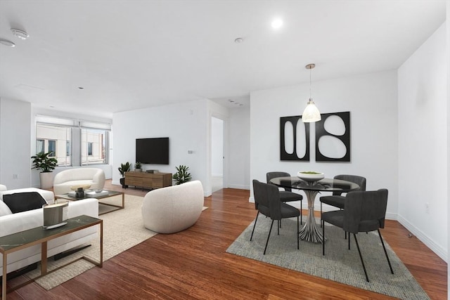 dining area featuring hardwood / wood-style floors