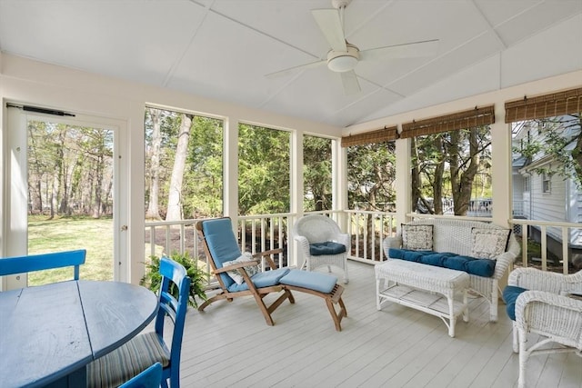sunroom / solarium featuring an outdoor living space and ceiling fan