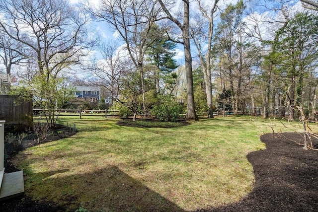 view of yard with fence