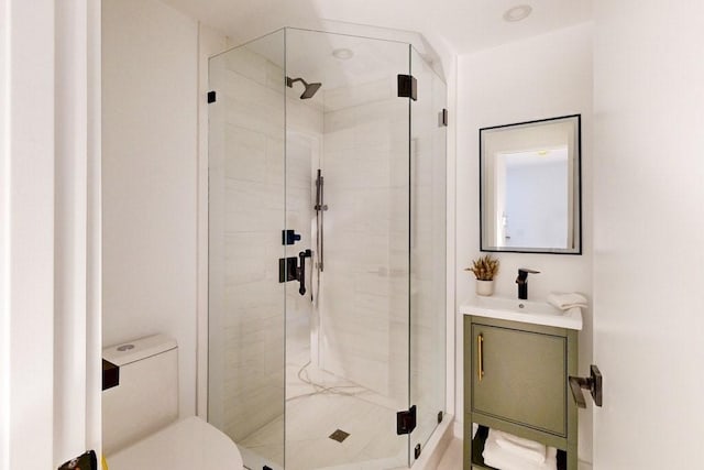 133 Charles St Unit 133, Cambridge, MA 02141 - bathroom featuring toilet, a stall shower, and vanity
