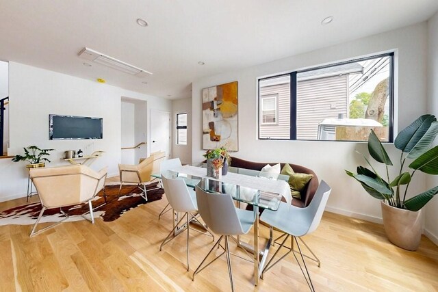 133 Charles St Unit 133, Cambridge, MA 02141 - dining area with wood finished floors, healthy amount of natural light, baseboards, and recessed lighting