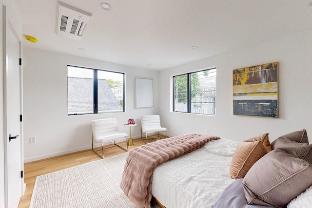 133 Charles St Unit 133, Cambridge, MA 02141 - bedroom featuring light wood-style floors and baseboards